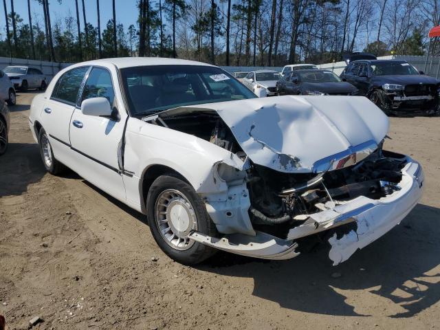Photo 4 from auction – 2002 LINCOLN TOWN CAR E with VIN 1LNHM81WX2Y608441