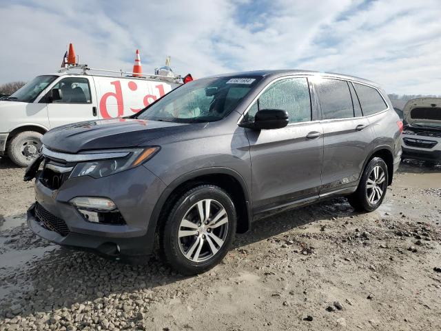 HONDA PILOT EXL 2018 with VIN 5FNYF6H50JB050713 - Photo from auction