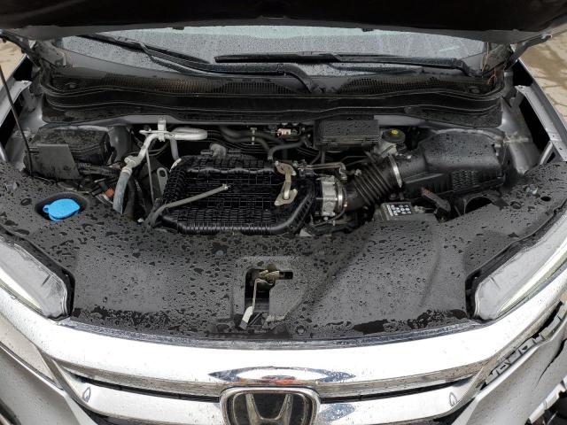 Photo 12 from auction – 2021 HONDA PILOT ELIT with VIN 5FNYF6H0XMB072940