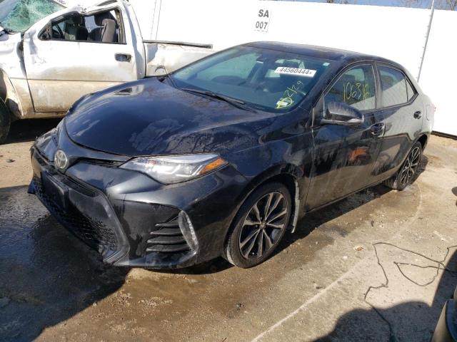 TOYOTA COROLLA L 2018 with VIN 5YFBURHE6JP794799 - Photo from auction