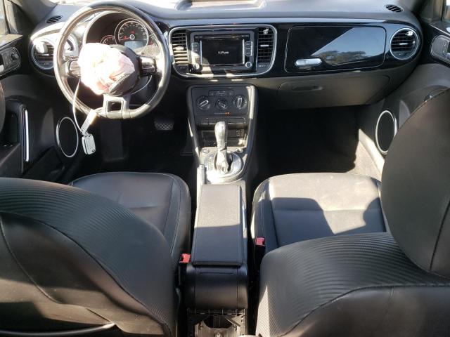 Photo 8 from auction – 2014 VOLKSWAGEN BEETLE with VIN 3VWJ17AT2EM660643
