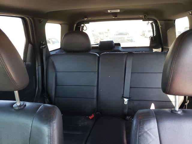 Photo 10 from auction – 2011 FORD ESCAPE LIM with VIN 1FMCU0EG3BKA43936