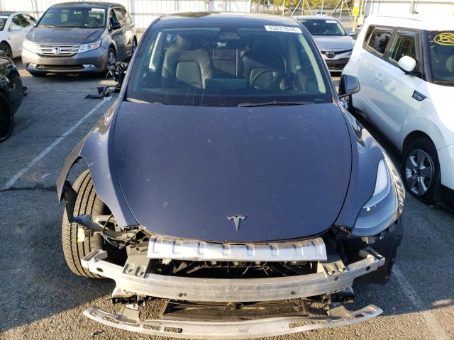 Photo 5 from auction – 2022 TESLA MODEL Y with VIN 7SAYGDEFXNF457221