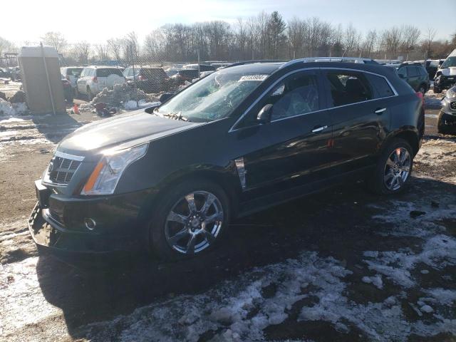 CADILLAC SRX PREMIU 2011 with VIN 3GYFNFEY2BS671530 - Photo from auction