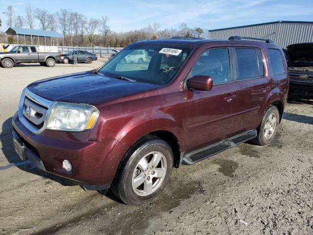 HONDA PILOT EXL 2011 with VIN 5FNYF4H61BB074551 - Photo from auction