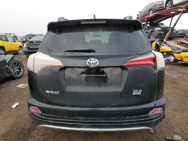 Photo 6 from auction – 2016 TOYOTA RAV4 XLE with VIN 2T3RFREV5GW493078