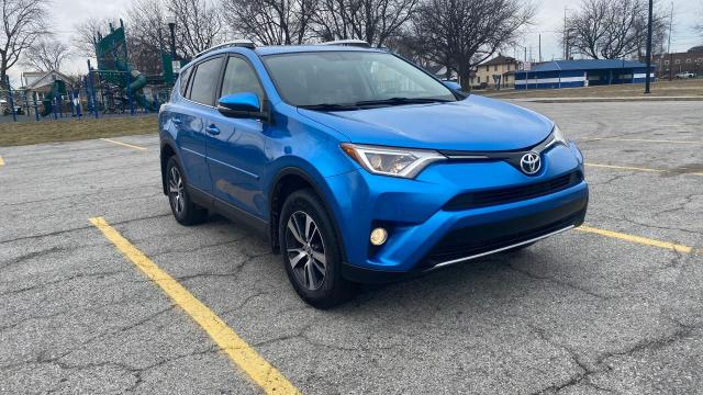 TOYOTA RAV4 XLE 2016 with VIN JTMRFREV7GJ102110 - Photo from auction