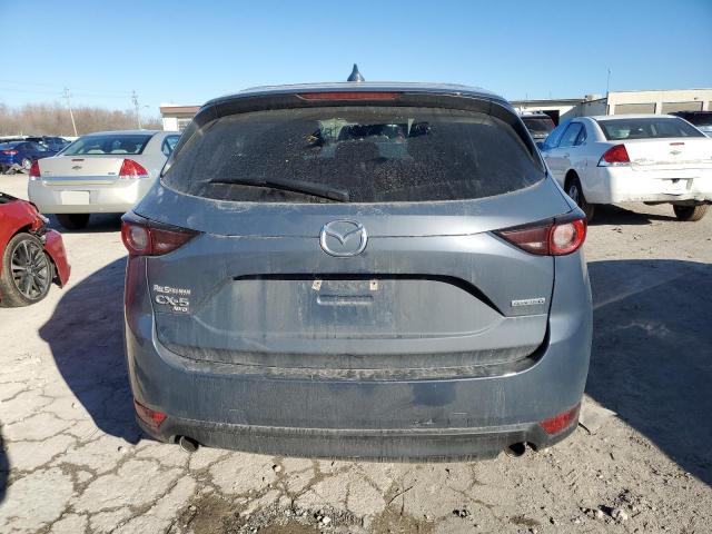Photo 6 from auction – 2021 MAZDA CX-5 TOURI with VIN JM3KFBCM2M0477673
