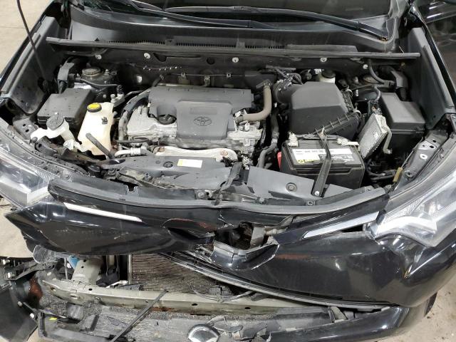 Photo 11 from auction – 2018 TOYOTA RAV4 LE with VIN 2T3BFREV4JW754032