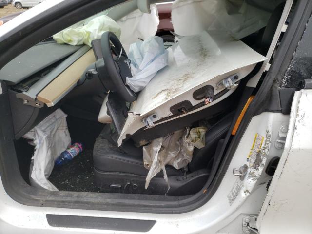 Photo 7 from auction – 2021 TESLA MODEL 3 with VIN 5YJ3E1EA0MF017040