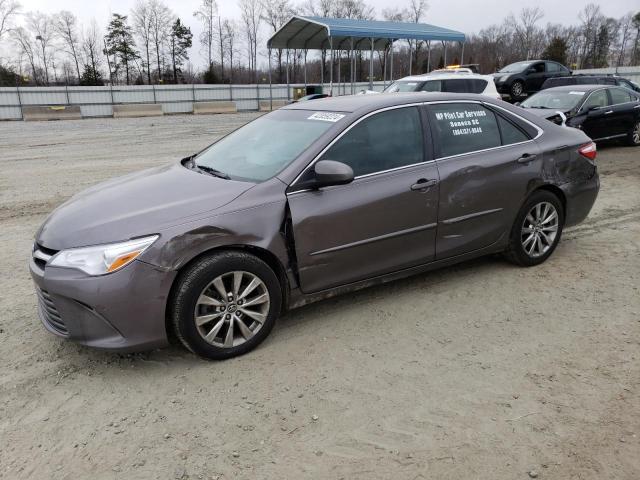 TOYOTA CAMRY LE 2016 with VIN 4T1BF1FK6GU262898 - Photo from auction
