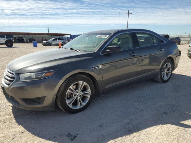 FORD TAURUS SE 2015 with VIN 1FAHP2D81FG133575 - Photo from auction