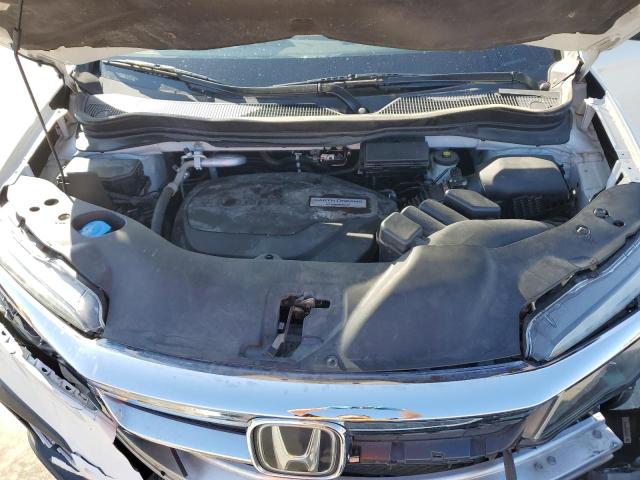 Photo 12 from auction – 2020 HONDA PILOT LX with VIN 5FNYF5H13LB028277