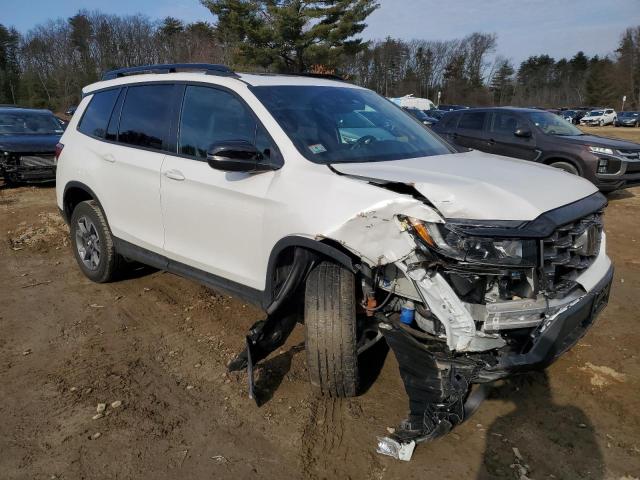 Photo 4 from auction – 2023 HONDA PASSPORT T with VIN 5FNYF8H69PB024690