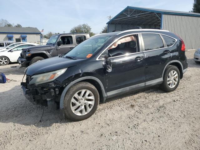 HONDA CR-V EXL 2015 with VIN 2HKRM4H75FH624554 - Photo from auction