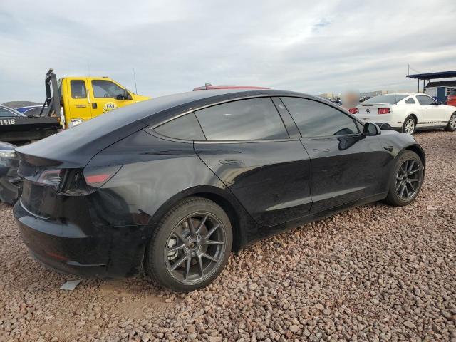 Photo 3 from auction – 2021 TESLA MODEL 3 with VIN 5YJ3E1EA4MF029188