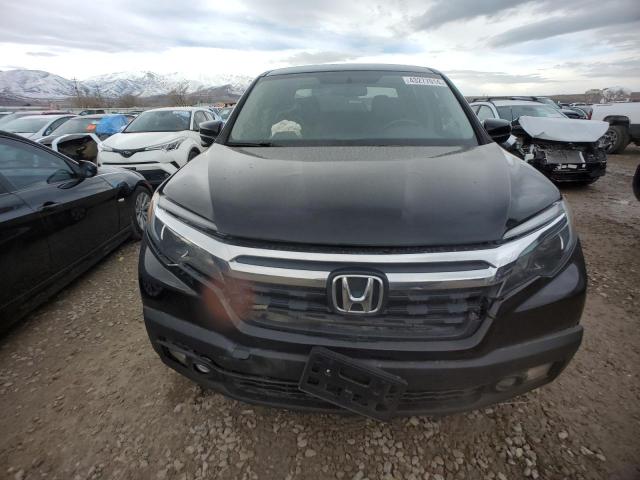 Photo 5 from auction – 2018 HONDA RIDGELINE with VIN 5FPYK3F68JB003488