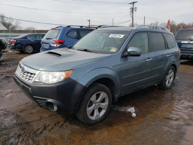 SUBARU FORESTER 2011 with VIN JF2SHGHC1BH731907 - Photo from auction