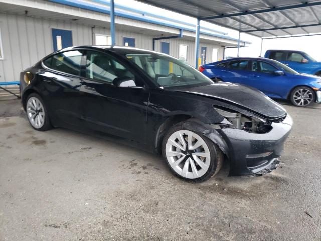 Photo 4 from auction – 2022 TESLA MODEL 3 with VIN 5YJ3E1EA9NF304202