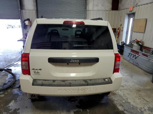Photo 6 from auction – 2009 JEEP PATRIOT SP with VIN 1J4FF28B49D249573