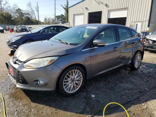 FORD FOCUS SEL 2012 with VIN 1FAHP3M21CL416420 - Photo from auction