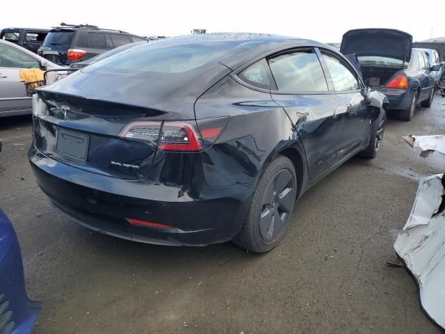 Photo 3 from auction – 2022 TESLA MODEL 3 with VIN 5YJ3E1EBXNF129788