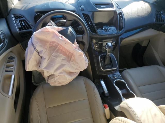 Photo 8 from auction – 2014 FORD ESCAPE TIT with VIN 1FMCU0JX8EUA73643