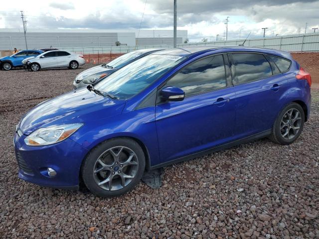 FORD FOCUS SE 2014 with VIN 1FADP3K21EL169663 - Photo from auction