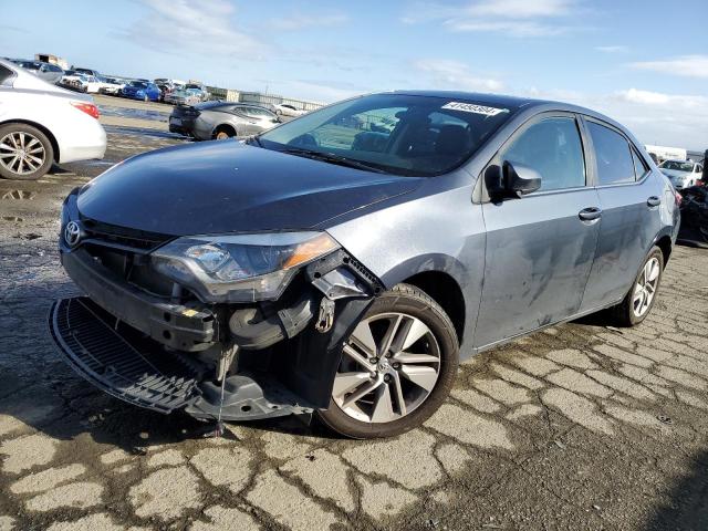 TOYOTA COROLLA EC 2015 with VIN 5YFBPRHE9FP251493 - Photo from auction