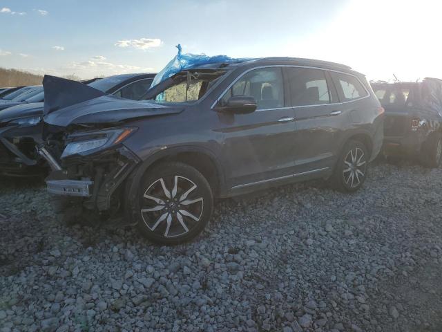 HONDA PILOT TOUR 2019 with VIN 5FNYF6H63KB054765 - Photo from auction