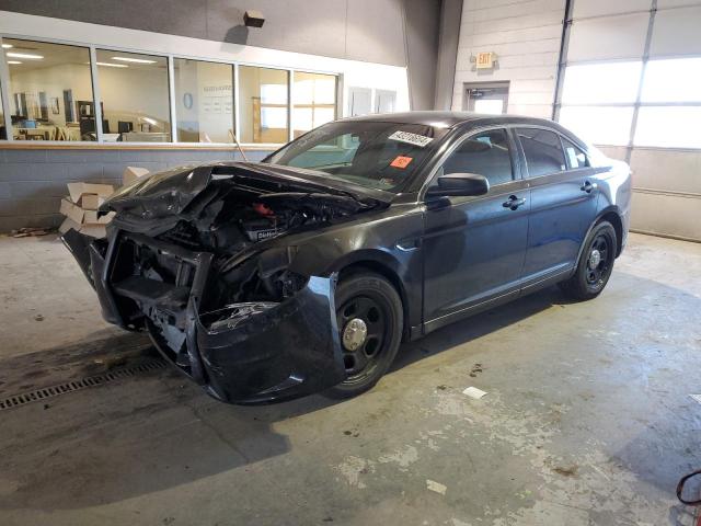 FORD TAURUS POL 2015 with VIN 1FAHP2MK0FG208102 - Photo from auction