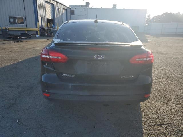 Photo 6 from auction – 2015 FORD FOCUS TITA with VIN 1FADP3J21FL294701
