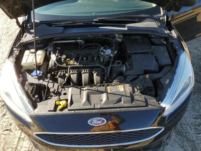 Photo 11 from auction – 2016 FORD FOCUS S with VIN 1FADP3E25GL342583