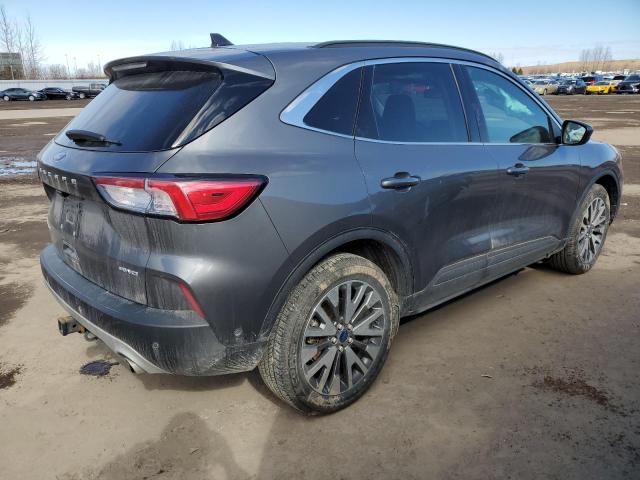 Photo 3 from auction – 2021 FORD ESCAPE TIT with VIN 1FMCU9J98MUA55115