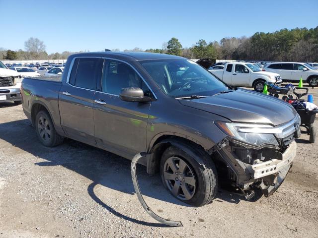 Photo 4 from auction – 2020 HONDA RIDGELINE with VIN 5FPYK3F72LB013834