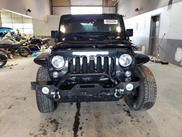 Photo 5 from auction – 2014 JEEP WRANGLER U with VIN 1C4HJWDG4EL174525