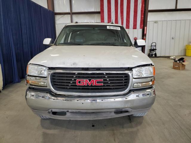 Photo 5 from auction – 2004 GMC YUKON with VIN 1GKEC13Z04R141928