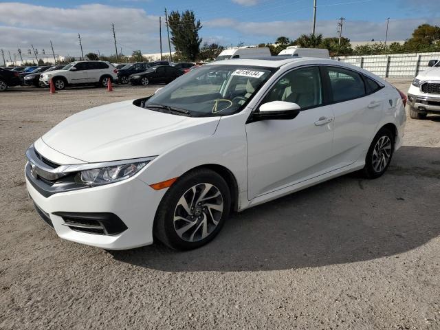 HONDA CIVIC EX 2018 with VIN 2HGFC2F78JH558131 - Photo from auction