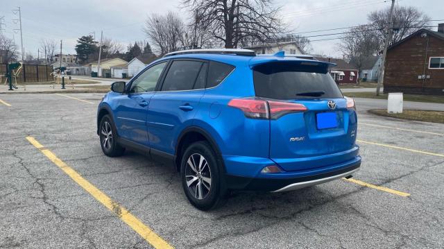 Photo 3 from auction – 2016 TOYOTA RAV4 XLE with VIN JTMRFREV7GJ102110
