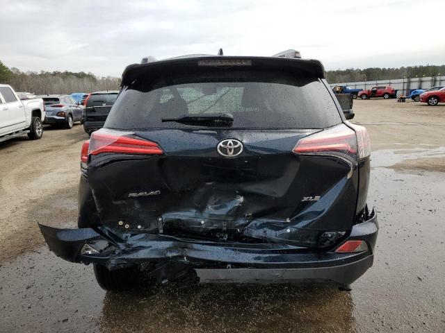Photo 6 from auction – 2017 TOYOTA RAV4 XLE with VIN JTMWFREV5HD103243