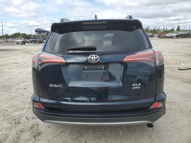 Photo 6 from auction – 2017 TOYOTA RAV4 XLE with VIN 2T3RFREV3HW659048