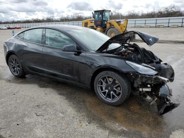 Photo 4 from auction – 2022 TESLA MODEL 3 with VIN 5YJ3E1EBXNF137843