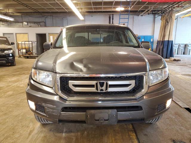 Photo 5 from auction – 2010 HONDA RIDGELINE with VIN 5FPYK1F46AB007560
