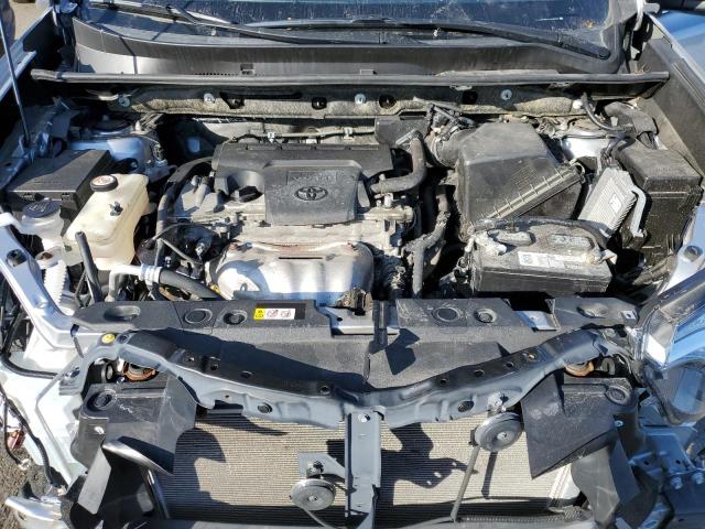 Photo 11 from auction – 2018 TOYOTA RAV4 LE with VIN JTMBFREV6JJ242593
