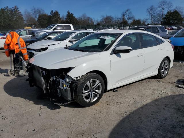 HONDA CIVIC LX 2018 with VIN 19XFC2F56JE015515 - Photo from auction