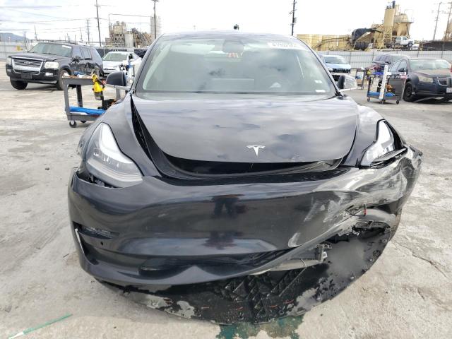 Photo 5 from auction – 2019 TESLA MODEL 3 with VIN 5YJ3E1EA7KF409753