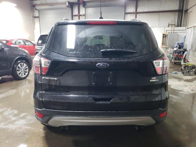 Photo 6 from auction – 2018 FORD ESCAPE SE with VIN 1FMCU9GD9JUA75347