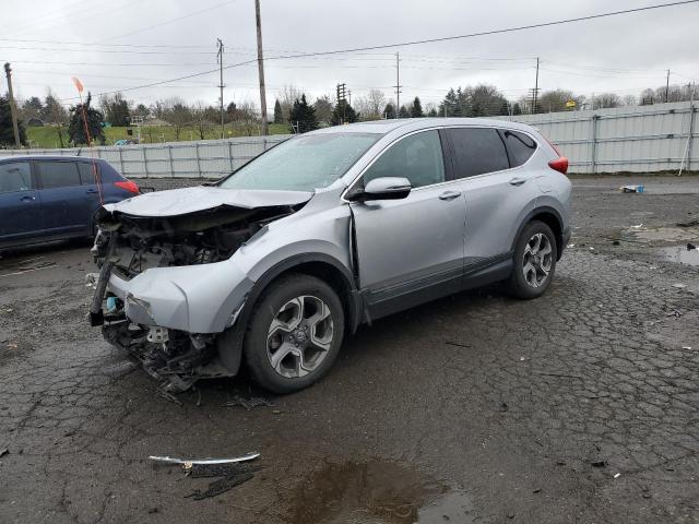 HONDA CR-V EX 2018 with VIN 7FARW2H52JE070043 - Photo from auction