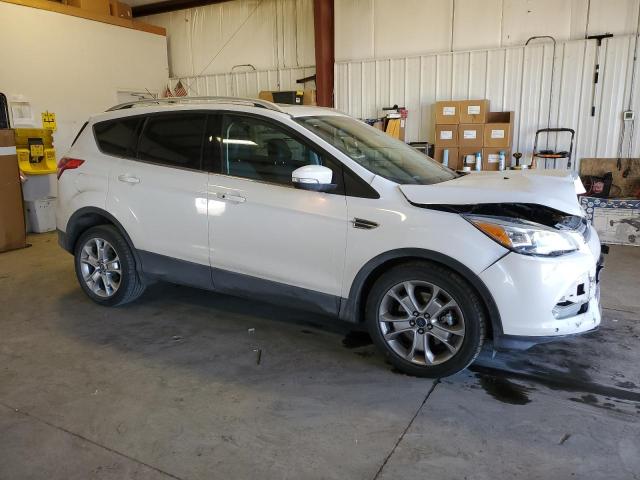 Photo 4 from auction – 2015 FORD ESCAPE TIT with VIN 1FMCU9J98FUA92703