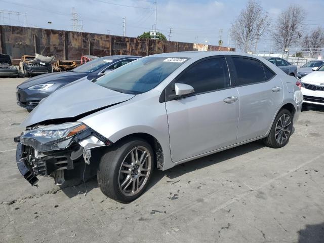 TOYOTA COROLLA L 2017 with VIN 5YFBURHE1HP697021 - Photo from auction